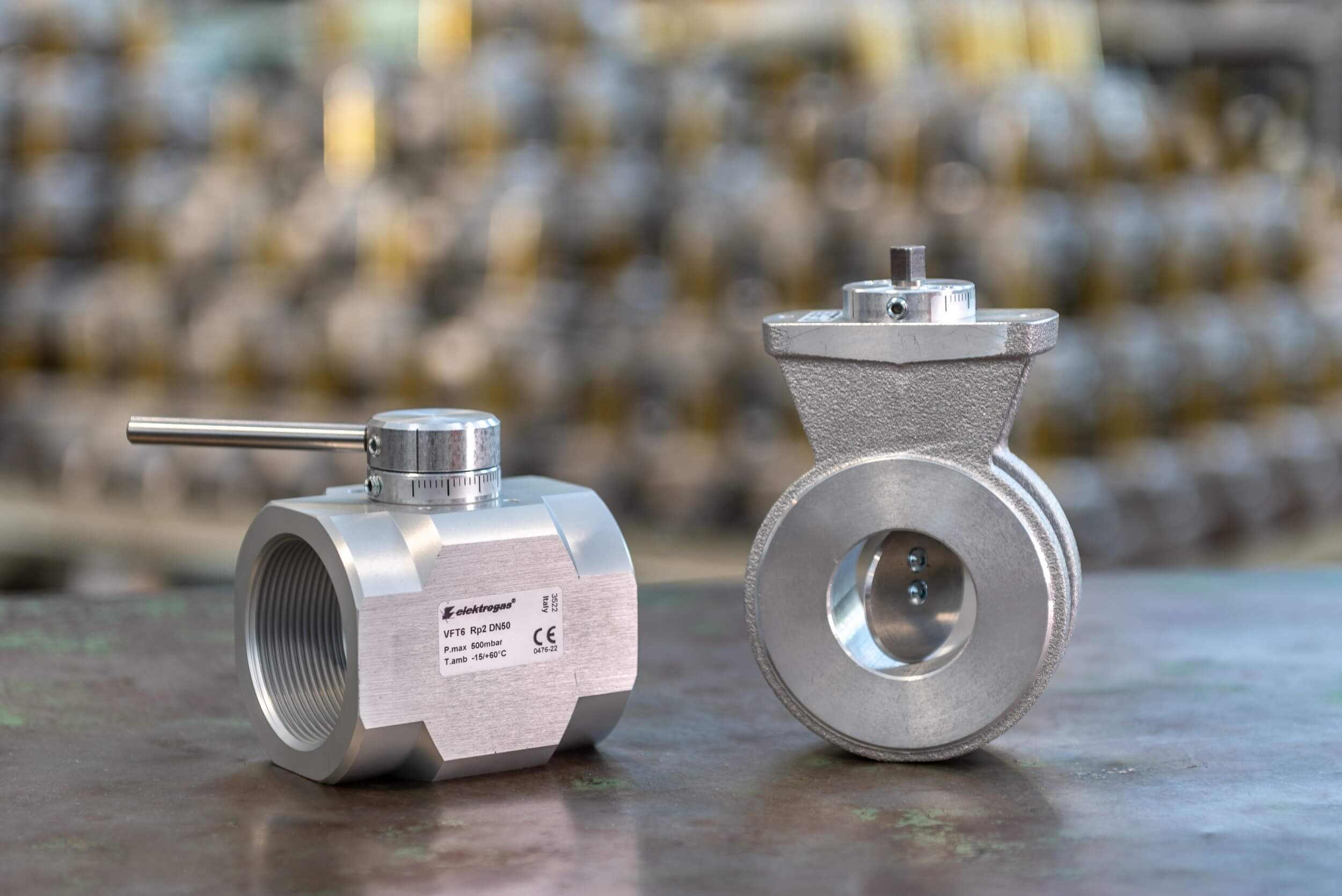 Elektrogas Aluminum and cast iron butterfly valves. VF, VFT, and VFH butterfly valves regulate and control air and gas flow by design. Valves can be adjusted either manually or automatically. In manual, a valve lever can set the fire rate of the burner. In automatic, fire rate can be set via a servomotor (modulating or staged control) or a solenoid actuator (two-stage control). The setting can be monitored on a graduated scale, allowing for precise regulation ratios. This type of device is suitable for air and gas adjustment in combustion processes, like industrial kilns, drying stoves, smelting, and annealing furnaces.