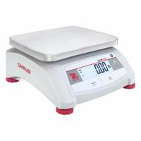 OHAUS Food Scale: 9 5/8 in Weighing Surface Dp, 7 1/2 in Weighing Surface Wd, 4 3/4 in Overall Ht (MPN V12P10T AM). Key specifications — Connection Ports: RS-232; Readability: 0.002 lb/1 g; Brand: OHAUS; IP Rating: Not IP Rated.