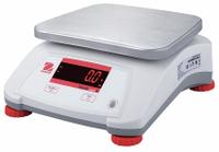 OHAUS Food Scale: 7 1/2 in Weighing Surface Dp, 9 1/2 in Weighing Surface Wd, 4 7/8 in Overall Ht (MPN V22PWE6T). Key specifications — Readability: 0.002 lb/1 g; Brand: OHAUS; IP Rating: IPX8.