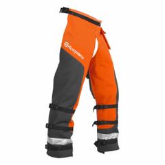 HUSQVARNA Technical Apron Wrap Chainsaw Chaps: Polyester, 32 in Overall Lg, Orange/Black, Waist (MPN 587160704). Key specifications — Color: Orange/Black; Brand: HUSQVARNA; Features: Adjustable waist size; Standards: ASTM F1897; Adjustable Locations: Waist; Back of Leg Coverage: Enclosed Back.