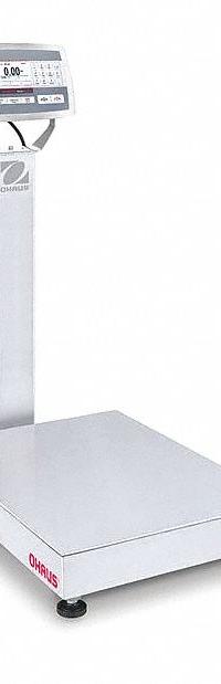 OHAUS Industrial Bench Scale: 18 in x 24 in, IP67, Column-Mounted, Defender 5000, Stainless Steel (MPN 30461698). Key specifications — Connection Ports: 2 In/4 Out Discrete I/O; Readability: 0.01 lb/5 g; Brand: OHAUS; Weighing Surface Material: Stainless Steel.
