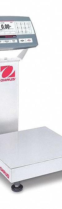 OHAUS Industrial Bench Scale: 12 in x 12 in, Not IP Rated, Column-Mounted, Defender 5000 (MPN 30461631). Key specifications — Connection Ports: USB; Readability: 0.002 lb/1 g; Brand: OHAUS; Weighing Surface Material: Stainless Steel.