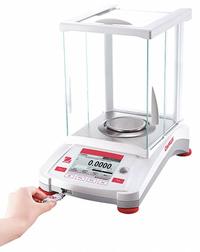 OHAUS Compact Bench Scale: 520 g Capacity, 0.001 g Readability, 0.001 g Repeatability, ABS (MPN AX523). Key specifications — Brand: OHAUS; Display Type: VGA Touchscreen.