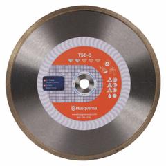 HUSQVARNA Diamond Saw Blade: Ceramic/Granite/Marble/Tile, 7 in Blade Dia., 5/8 in Arbor Size, Good (MPN TACTI-CUT C 7). Key specifications — attr1097734: Wet/Dry; attr1097738: Circular Saw; attr1097751: HUSQVARNA.